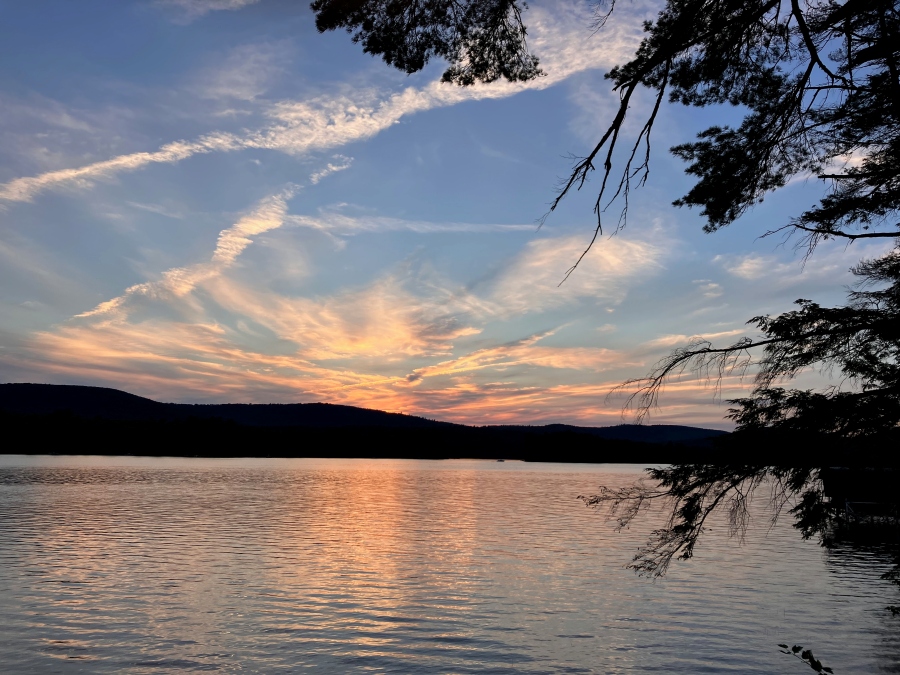 Pink and blue sunset reflected in the lake